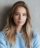 pretty-woman-standing-over-grey-wall-background-4A829TX